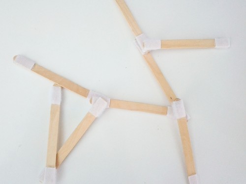 Super fun toddler activity: Velcro popsicle sticks. Put velcro on both ends of popsicle sticks, then use them to make shapes, letters, and more.