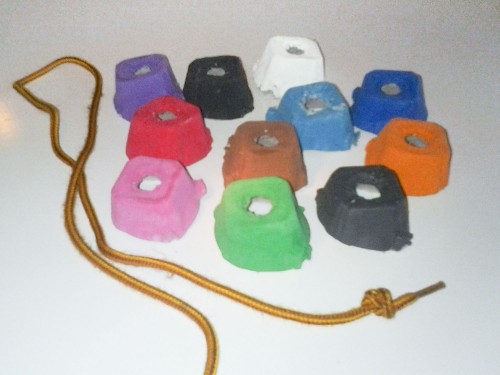 Toddler Activity Idea: Bead painted egg carton pieces onto a shoelace