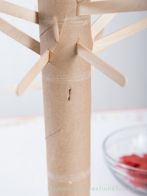 Fall Leaves on Tree Activity - Cut a hole in the paper towel roll - Moms Have Questions Too