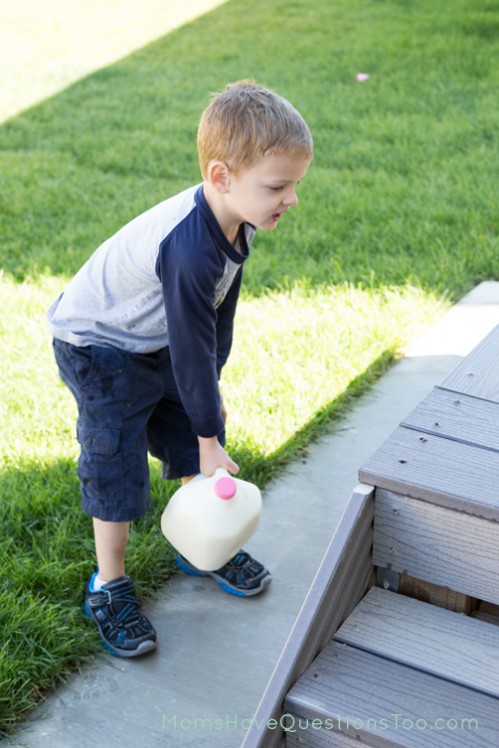 Lifiting milk jug onto porch - Moms Have Questions Too