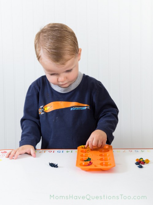 Sorting pasta into an ice cube tray busy bag idea - Moms Have Questions Too