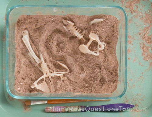 Dig up fossils in sensory dirt - Moms Have Questions Too