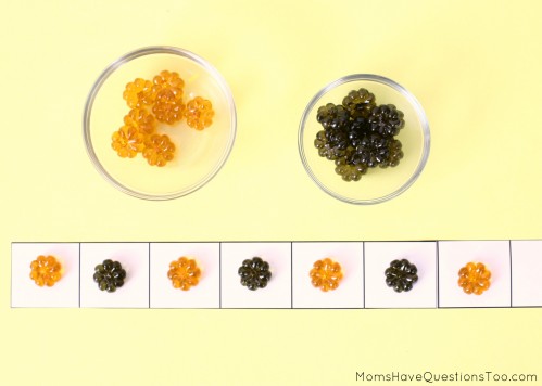 15 toddler activities that use table scatter (also called math manipulatives). These teach counting, creativity, fine motor, and more!