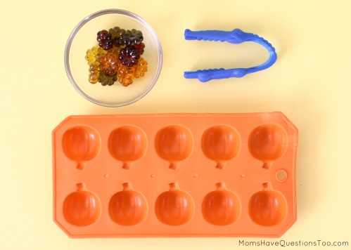 15 toddler activities that use table scatter (also called math manipulatives). These teach counting, creativity, fine motor, and more!