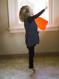 Halloween Skeleton Scavenger Hunt Finding Clue on the Cupboard