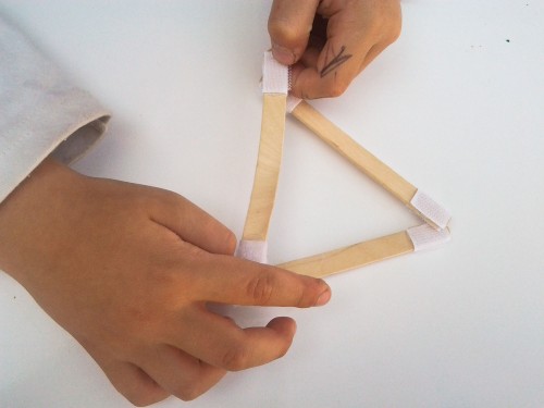 Super fun toddler activity: Velcro popsicle sticks. Put velcro on both ends of popsicle sticks, then use them to make shapes, letters, and more.