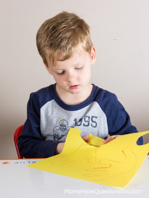 Cutting Out Traced Hands Lilies Spring Craft Idea - Moms Have Questions Too