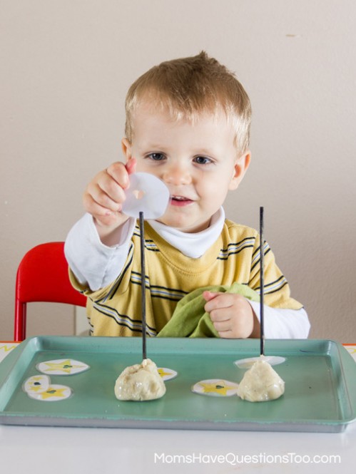 Thread Stars onto skewers - Space Themed Tot School Trays - Moms Have Questions Too