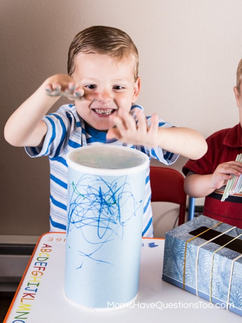 Oatmeal Container Drum - Toddler Music Activity - Homemade Instruments - momshavequestinostoo.com