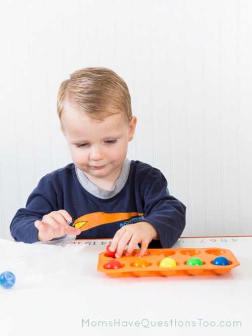 Color Matching Balls in an ice cube tray busy bag idea - Moms Have Questions Too