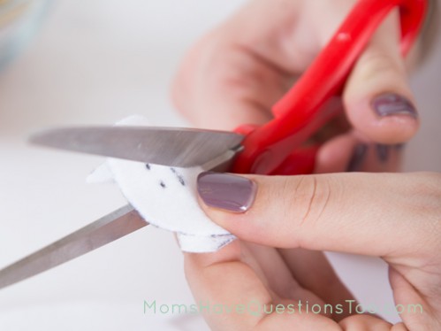 Cut slit in ghost for ghost tree activity - Moms Have Questions Too